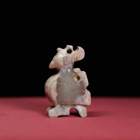 A Chinese Carved Jade Bird Statuette