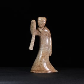 A Chinese Carved Jade Figure of Dancer