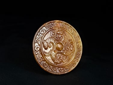 A Chinese Carved Jade Dragon Pendant