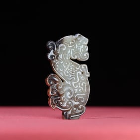 A Chinese Carved Jade Dragon Pendant