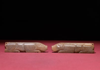 A Pair of Chinese Carved Jade Pig Statuettes