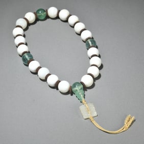 A Chinese Carved Rock Crystal and Mother of Pearl Prayers Beads