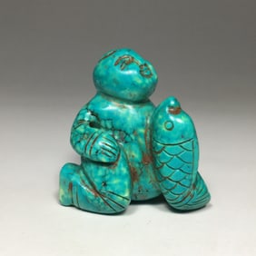 A Chinese Carved Turquoise Figure of Boy and Fish
