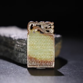 A Chinese Carved Jade Dragon Pendant