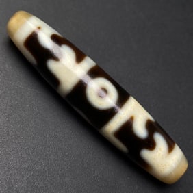 A Chinese Carved Agate DZI Bead