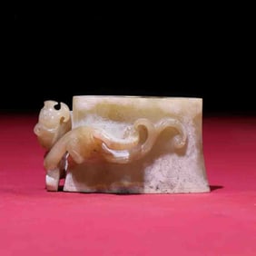 A Chinese Carved Jade Dragon Sword Hand Guard