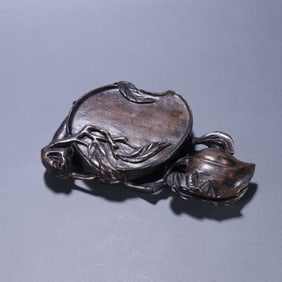 A Chinese Carved Hardwood Peach-Shape Brush Paste