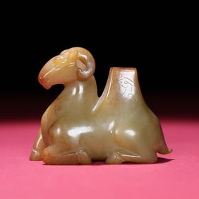 A Chinese Carved Jade Goat Statuette