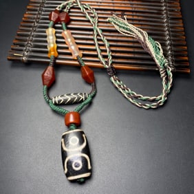 A A Chinese Carved Agate DZI Bead Necklace