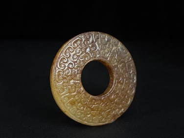 A Chinese Carved Jade Dragon Ring Pendant