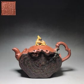 A Chinese Carved Yixing Clay Tea Pot
