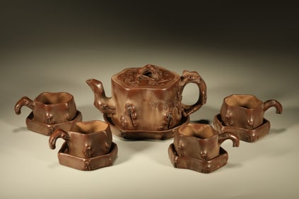A Chinese Carved Yixing Clay Tea Set