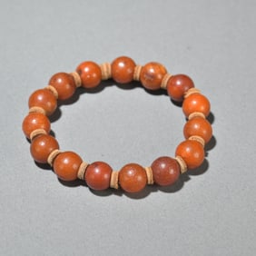 A Chinese Carved Amber Beads Bracelet