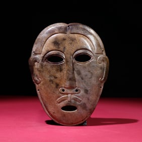 A Chinese Carved Jade Mask