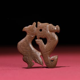A Chinese Carved Jade Dragon and Phenix Pendant