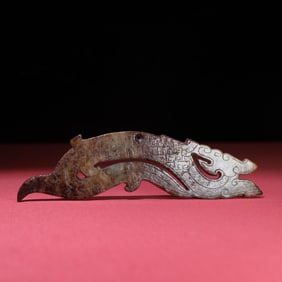 A Chinese Carved Jade Dragon Pendant