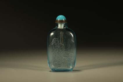 A Chinese Carved Peking Glass Snuff Bottle