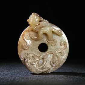 A Chinese Carved Jade Dragon Pendant