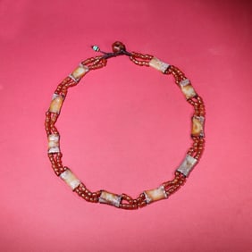 A Chinese Carved Jade and Agate Bracelet