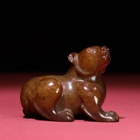 A Chinese Carved Jade Bear Statuette