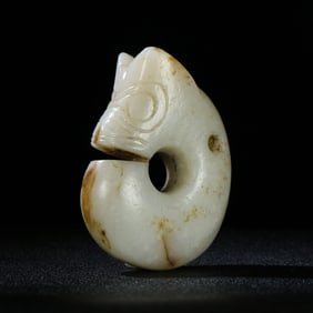 A Chinese Carved Jade Dragon Pendant