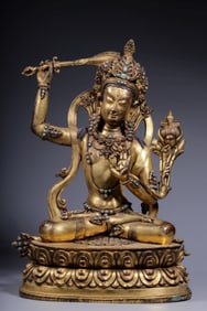 A Chinese Gilt Bronze Figure of Buddha