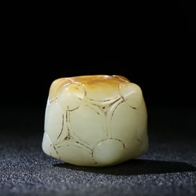 A Chinese Carved Jade Bead