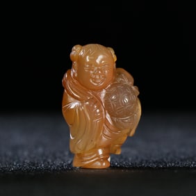 A Chinese Carved Agate Figure of Boy Pendant
