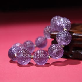 A Chinese Carved Peking Glass Bracelet