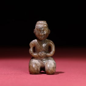 A Chinese Carved Jade Kneeling Man