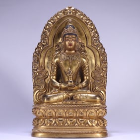 A Chinese Gilt Bronze Figure of Buddha