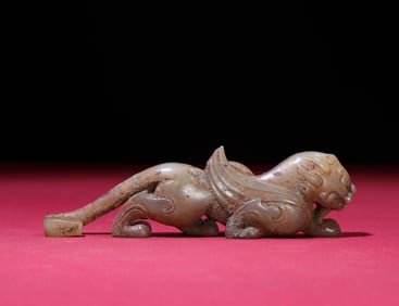 A Chinese Carved Jade Foo-Dog Belt Buckle