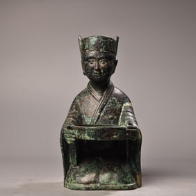 A Chinese Bronze Figure of Kneeling Man