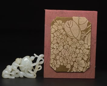 A Chinese Carved Jade Monkey and Peach Statuette