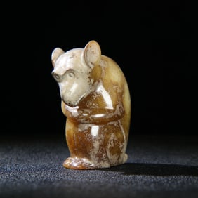 A Chinese Carved Jade Monkey Statuette