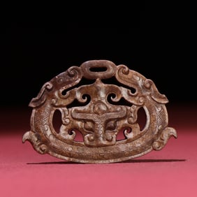 A Chinese Carved Jade Dragon Pendant