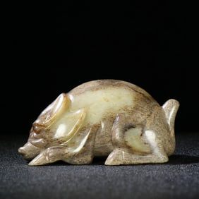 A Chinese Carved Jade Pig Statuette