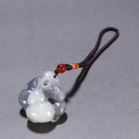 A Chinese Carved Jade Double-Gourds Pendant