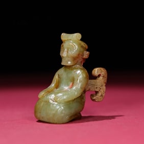 A Chinese Carved Jade Kneeling Man