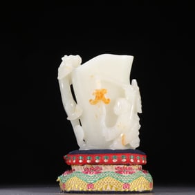 A Chinese Carved Jade Dragon and Boy Cup