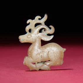 A Chinese Carved Jade Deer Statuette