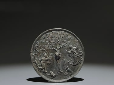 A Chinese Bronze Mirror