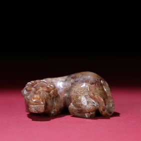 A Chinese Carved Jade Foo-Dog Statuette