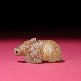 A Chinese Carved Jade Bull Statuette