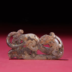 A Chinese Carved Jade Dragon Pendant
