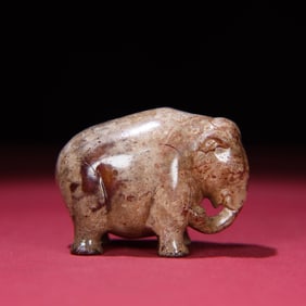 A Chinese Carved Jade Elephant Statuette