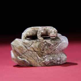 A Chinese Carved Jade Dragon Statuette