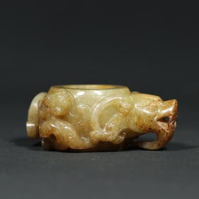 A Chinese Carved Jade Dragon Statuette