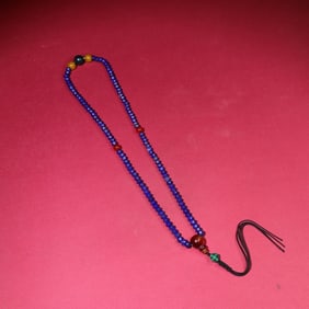 A Chinese Carved Lapiz Lazuli Necklace