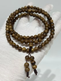 A Chinese Carved Agar-Wood Prayers Beads